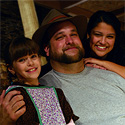 Photo #3: Cherish Myers, Mark Boughton and Adrianna Quinones in 'A Little House Christmas'